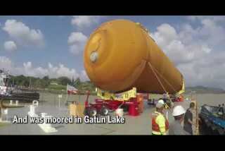 Space shuttle fuel tank, the last of its kind, travels through the Panama Canal