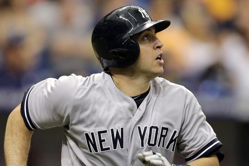 New York Yankees first baseman Mark Teixeira runs after hitting a home run against the Tampa Bay Rays in August. The Arundel product and Mount St. Joseph grad was hitting .217 with 21 homers through Thursday.