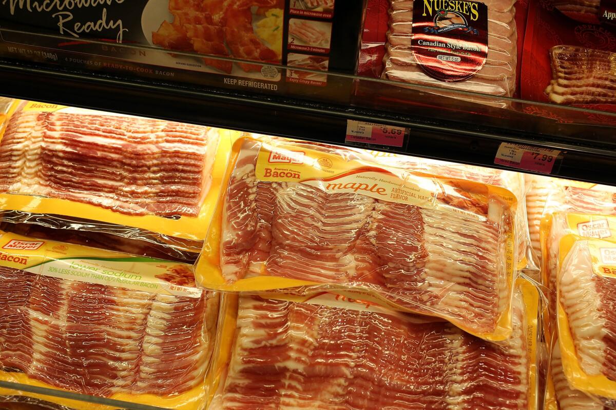 Processed meats are displayed in a grocery store in Miami. A World Health Organisation report found that eating processed meat can increase a person's risk of developing colorectal cancer.
