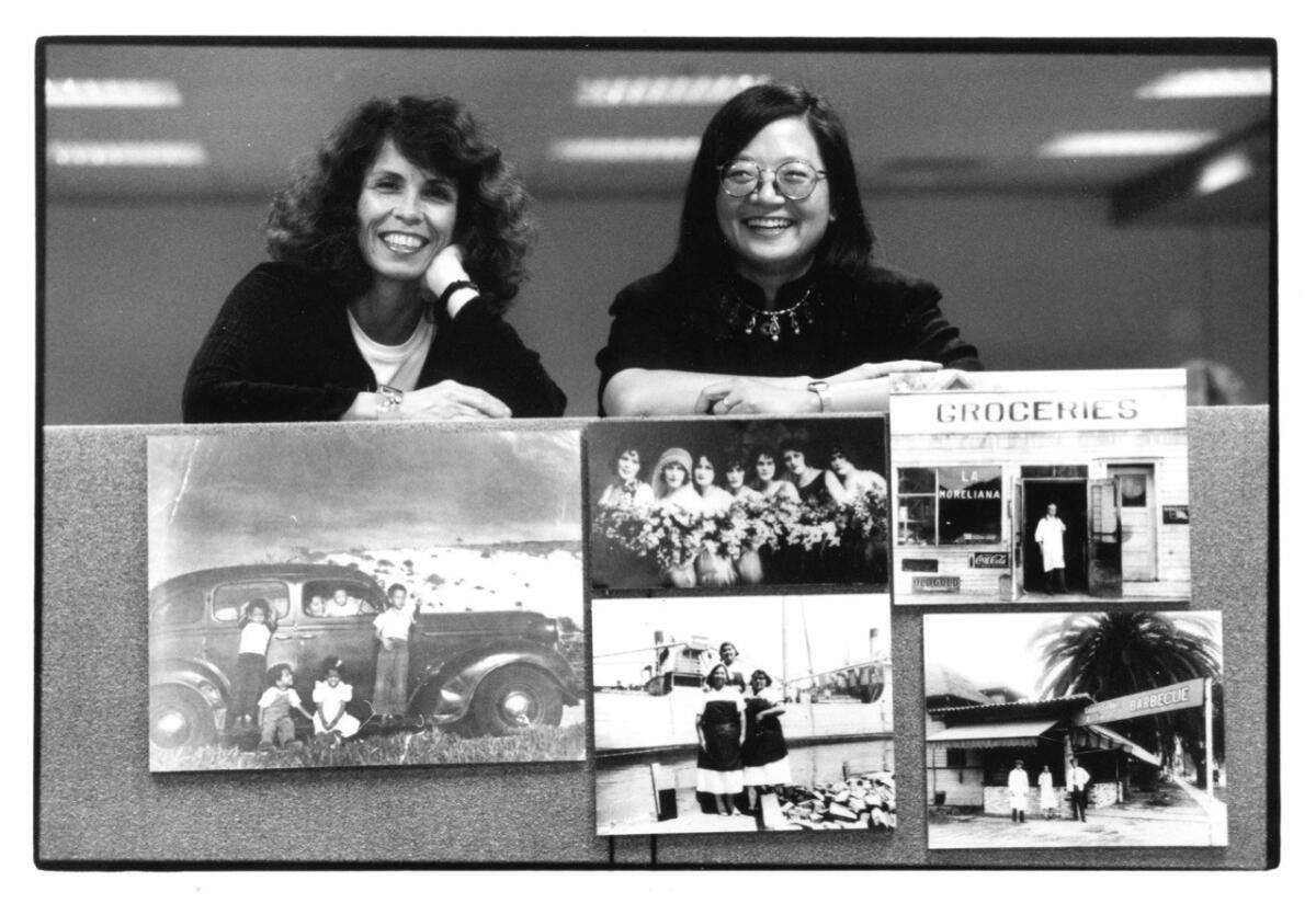 Carolyn Kozo Cole, left, and Kathy Kobayashi in the LAPL History Department workroom.