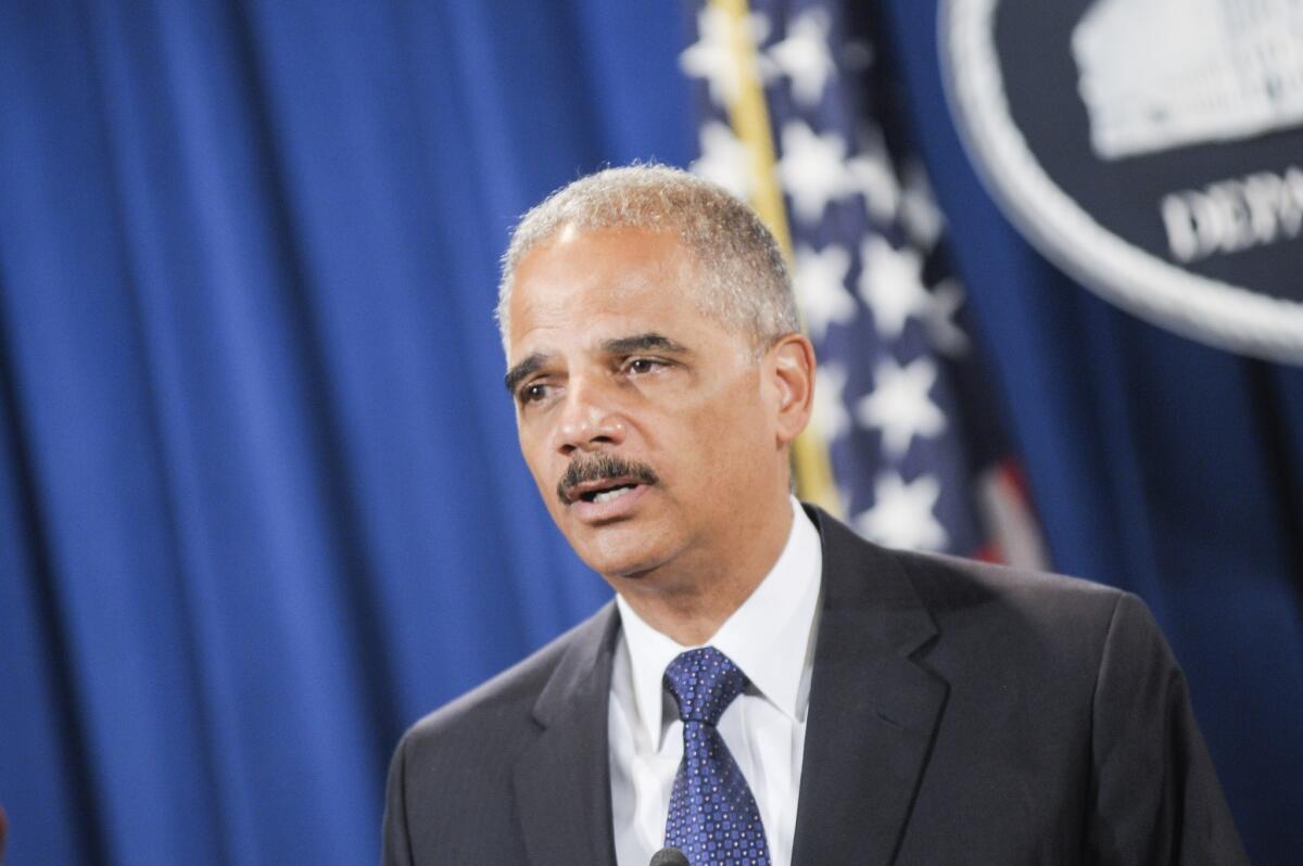 U.S. Atty. Gen. Eric H. Holder Jr. has compared defending a ban on same-sex marriage to defending the system of segregated public schools in Kansas that was declared unconstitutional by the Supreme Court in 1954.