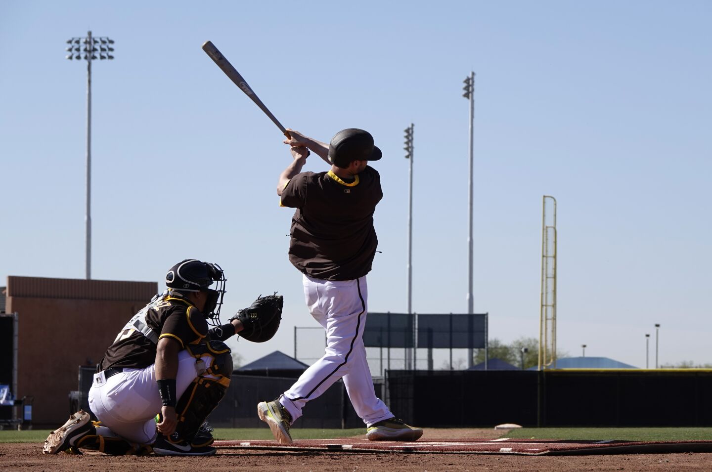 San Diego Padres Wil Myers bats during a spring training practice on Feb. 20, 2020.