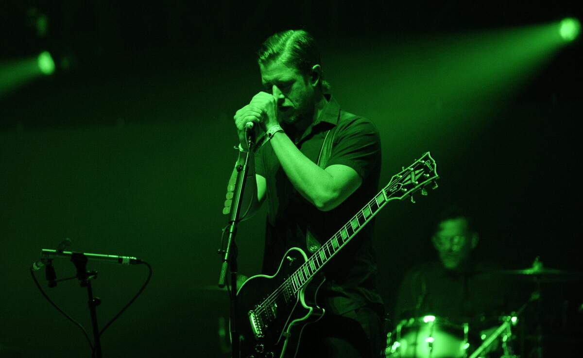 Paul Banks and his group Interpol were a highlight of the 25th annual KROQ Almost Acoustic Christmas at the Forum in Inglewood on Sunday.