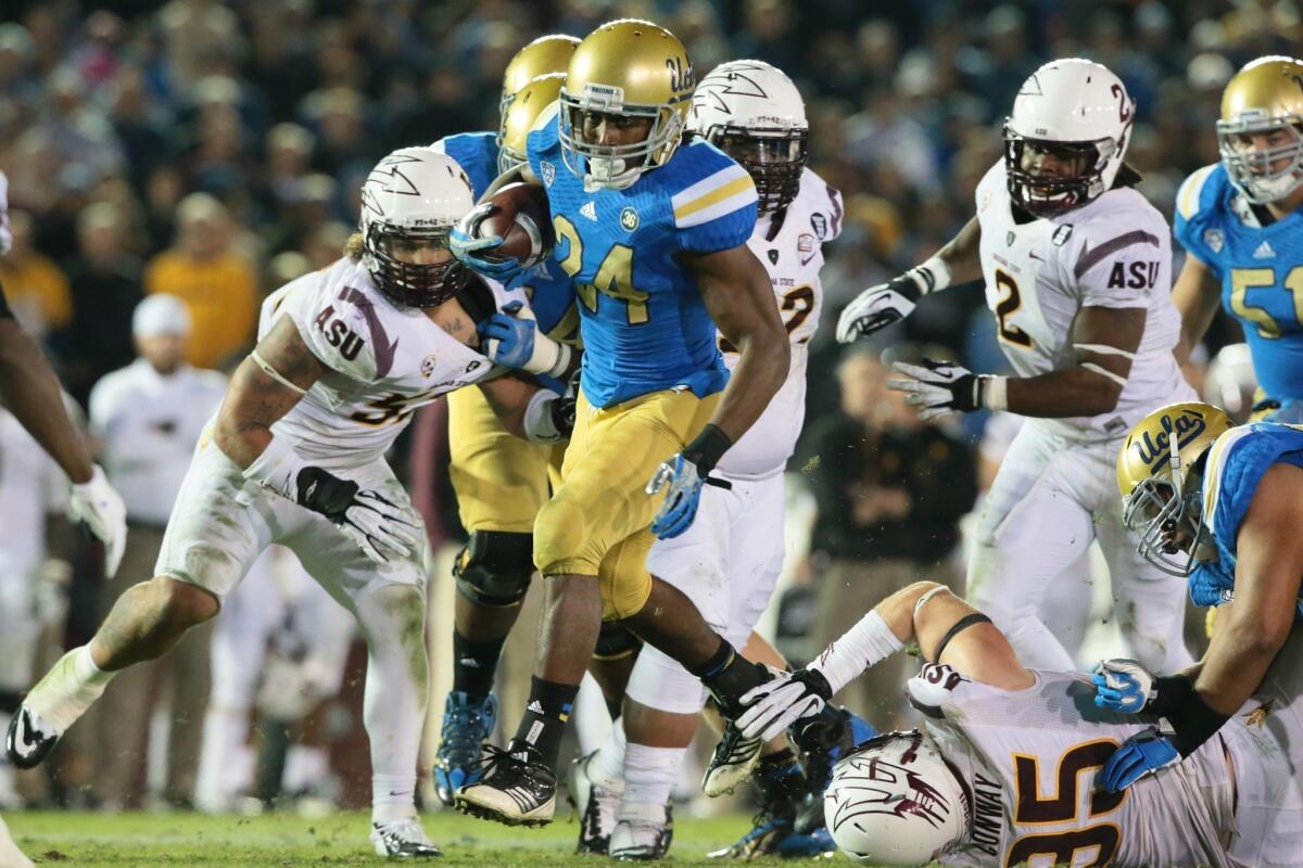 Running back Paul Perkins and the Bruins fell to the Sun Devils, 38-33, last season.