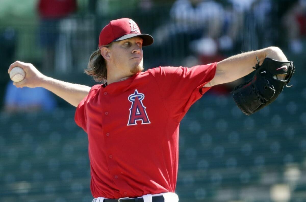 Angels' Jered Weaver throws during the first inning of an exhibition against Italy on March 6.