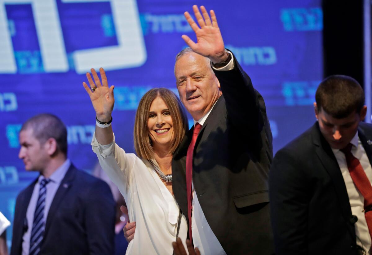 Benny Gantz with his wife, Revital, at campaign headquarters in Tel Aviv on Sept. 18.