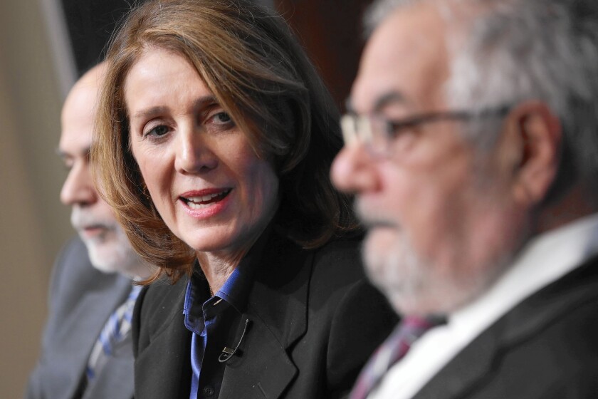 Morgan Stanley Chief Financial Officer Ruth Porat participates in a panel discussion at the Brookings Institution this month with former Fed Chairman Ben S. Bernanke, left, and former House Financial Services Committee Chairman Barney Frank (D-Mass.).