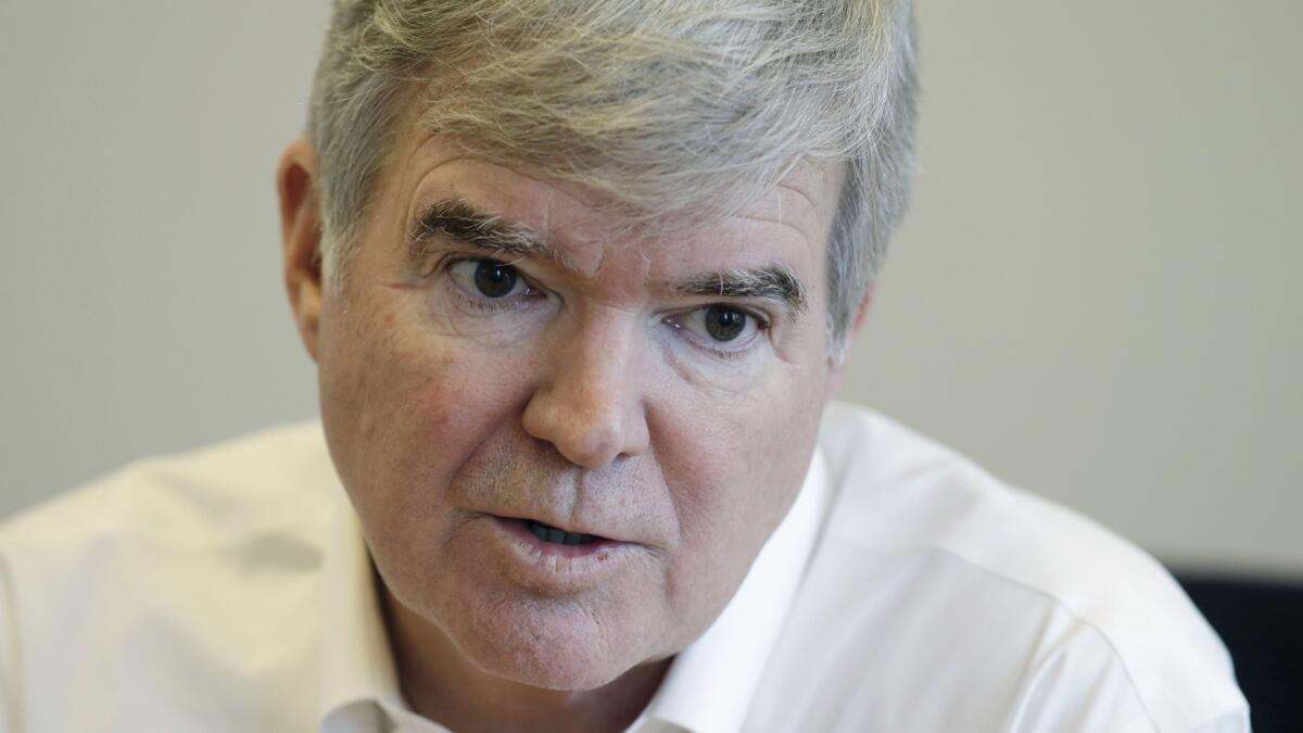 NCAA President Mark Emmert responds to a question during an interview in Indianapolis on Oct. 27.