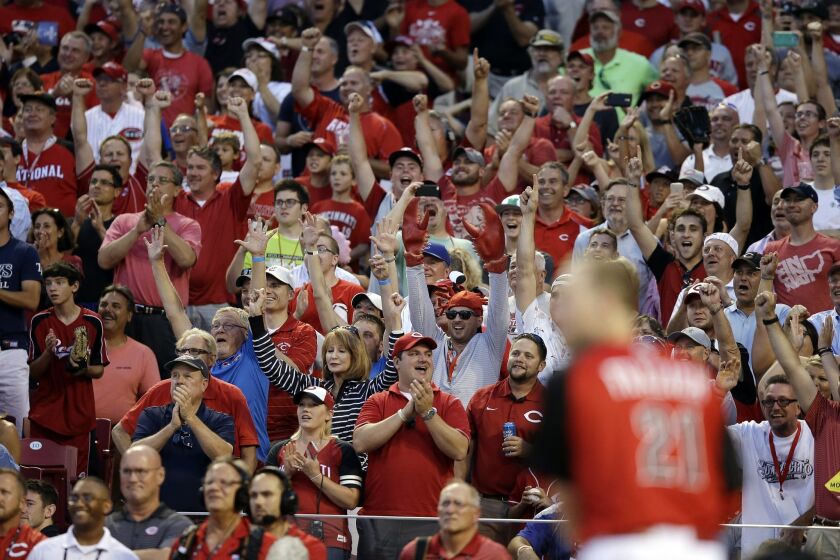 Fans cheer for National League’s Todd Frazier, of the Cincinnati Reds, as he hits during the MLB All-Star baseball Home Run Derby, Monday, July 13, 2015, in Cincinnati. (AP Photo/John Minchillo)