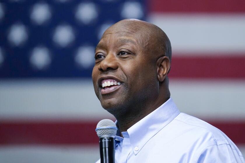 FILE - Sen. Tim Scott, R-S.C., speaks during a town hall, Monday, May 8, 2023, in Manchester, N.H. Scott has filed paperwork to enter the 2024 Republican presidential race. He'll be testing whether a more optimistic vision of America’s future can resonate with GOP voters who have elevated partisan brawlers in recent years. (AP Photo/Charles Krupa, File)
