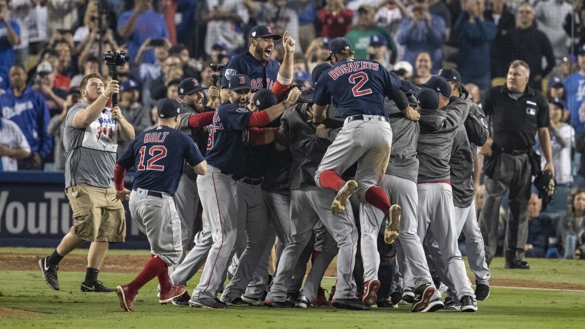 The Boston Red Sox celebrate their 5-1 World Series win over the Dodgers.