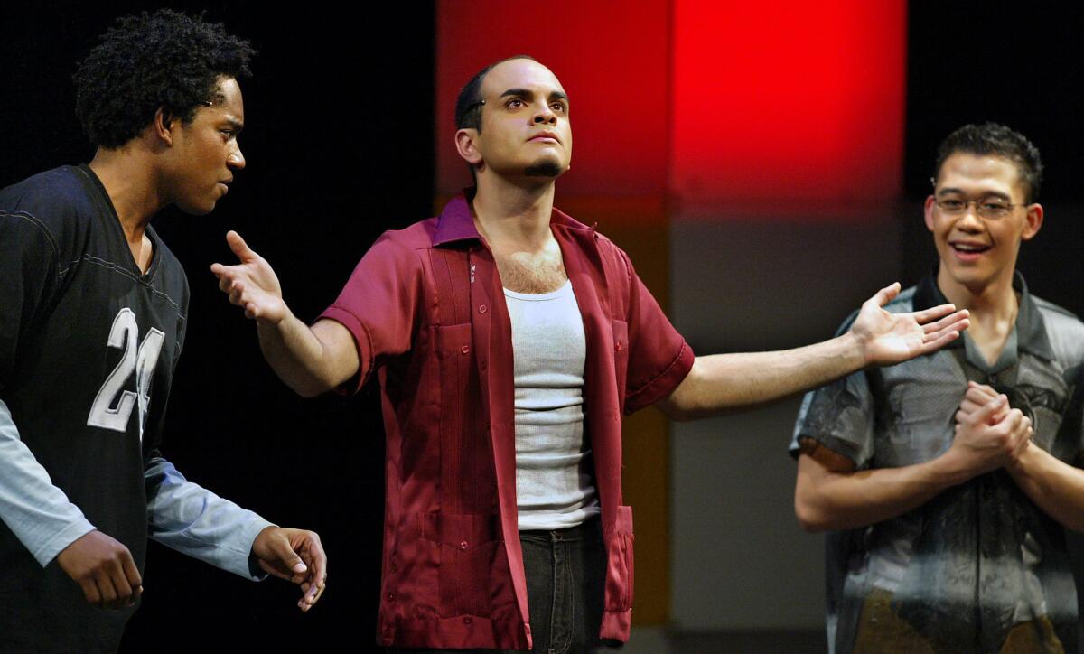 From left, Miles Ellington Gregley, Rafael Agustin and Allan Axibal perform "N*gger Wetb*ck Ch*nk" at the UCLA Freud Playhouse in 2004.