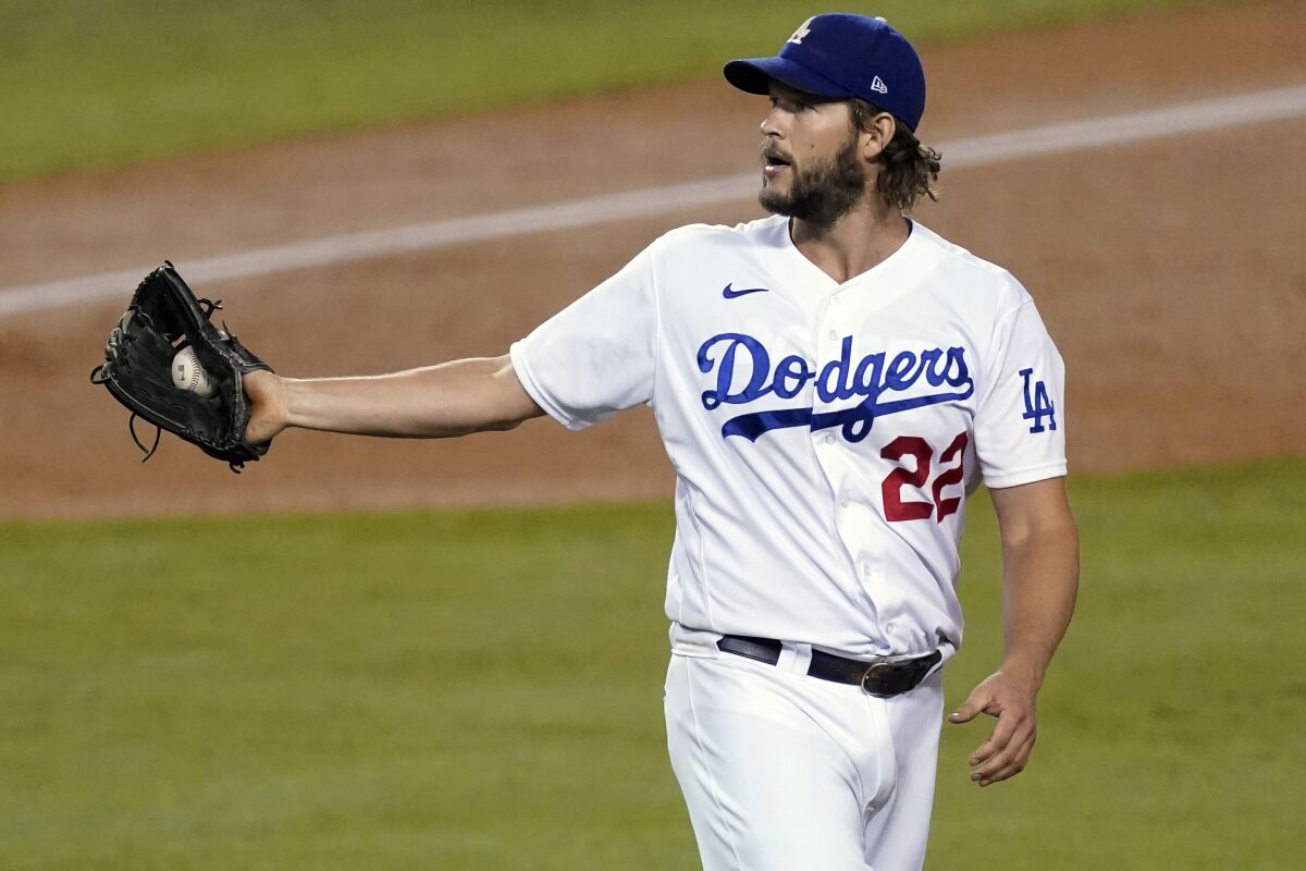 Dodgers starting pitcher Clayton Kershaw gets the ball back from the catcher in Game 2 on Thursday.