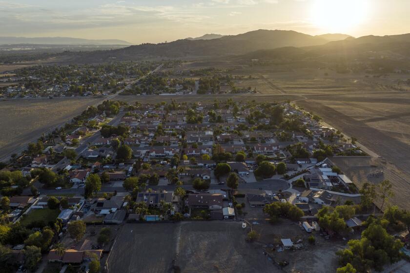 MORENO VALLEY, CA - JULY 20: The sun sets over the north-eastern section of Moreno Valley. Photographed on Wednesday, July 20, 2022 in Moreno Valley, CA. (Myung J. Chun / Los Angeles Times)