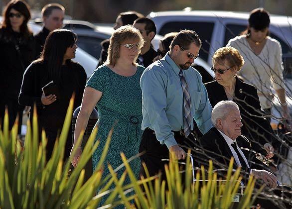 Funeral for victims of Christmas Eve shooting rampage