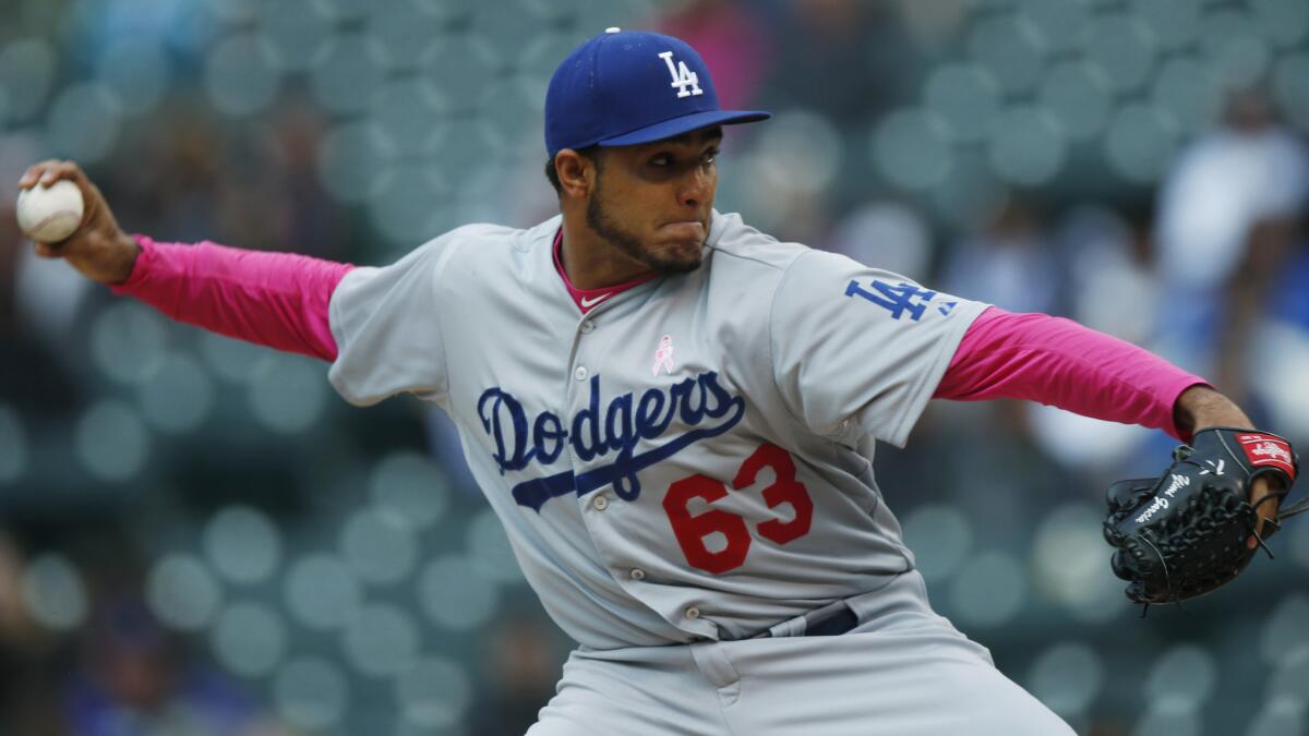 Dodgers reliever Yimi Garcia delivers a pitch during a win over the Colorado Rockies on May 10.