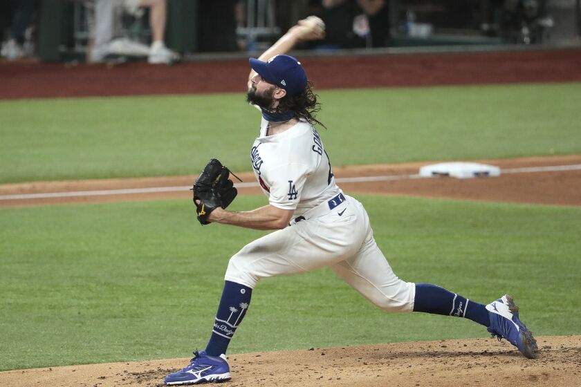 Dodgers starting pitcher Tony Gonsolin delivers during Game 7 of the NLCS.