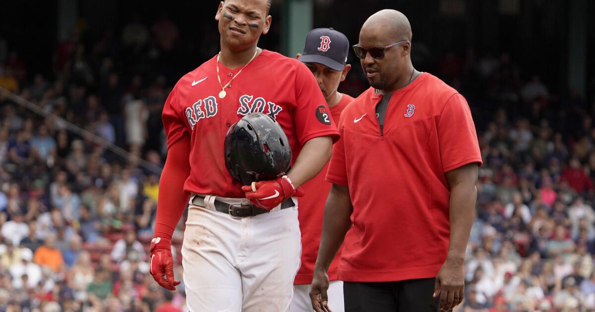 Red Sox 3B Devers practices with teammates on, off field