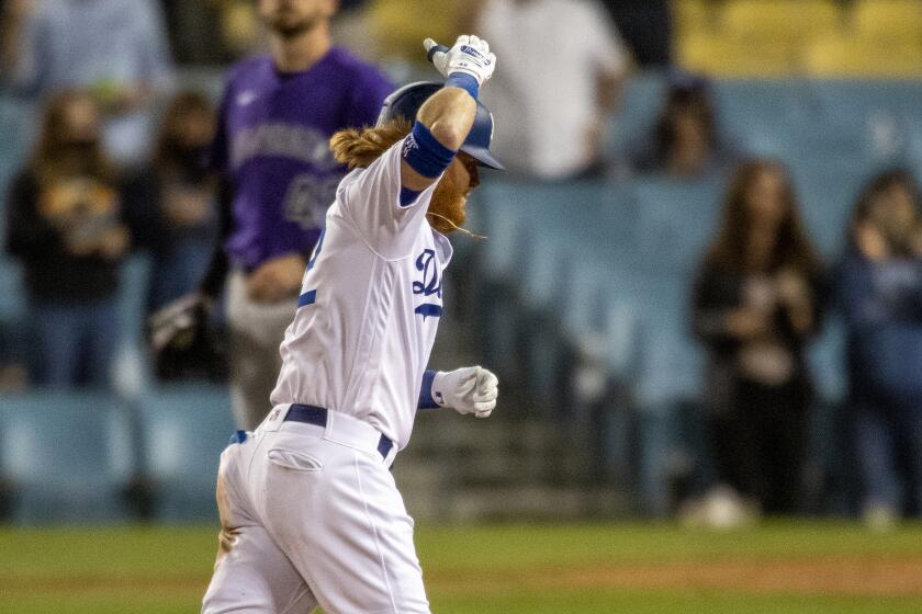 LOS ANGELES, CA - APRIL 15, 2021: Los Angeles Dodgers third baseman Justin Turner (10) rounds the bases.