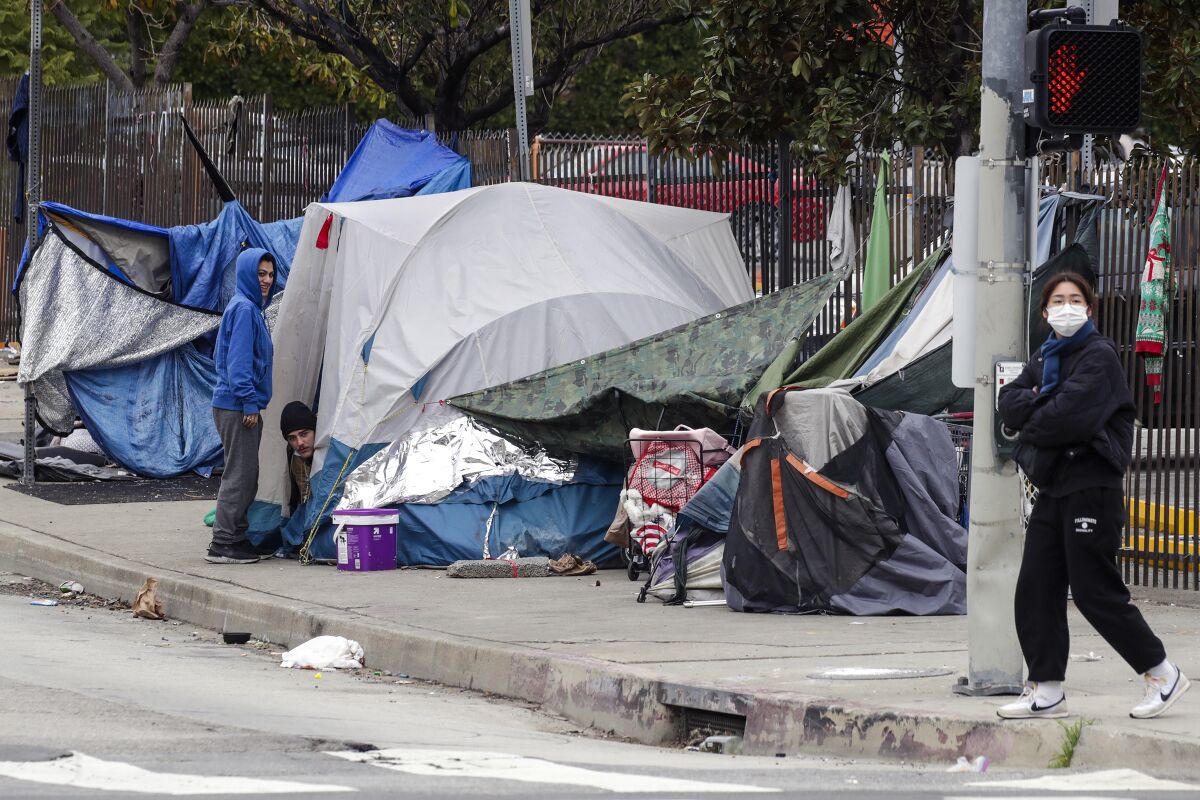  A homeless encampment on sidewalk 