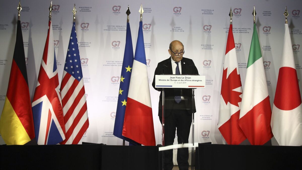 French Foreign Minister Jean-Yves Le Drian attends a press conference on the second day of a G-7 meeting at ministerial level in Dinard, Brittany, France, on Saturday.