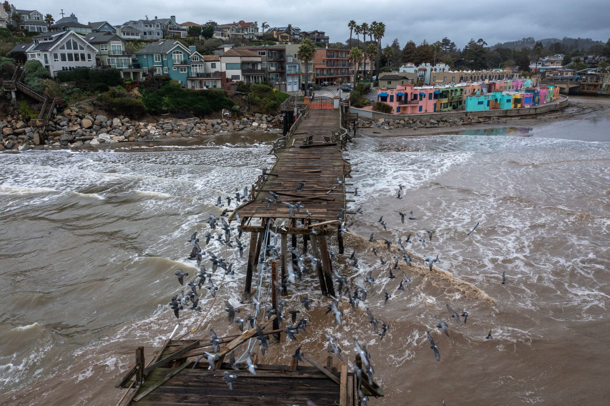 This aerial view shows the Capitola Pier, built in 1857, damaged after recent storms in Capitola.