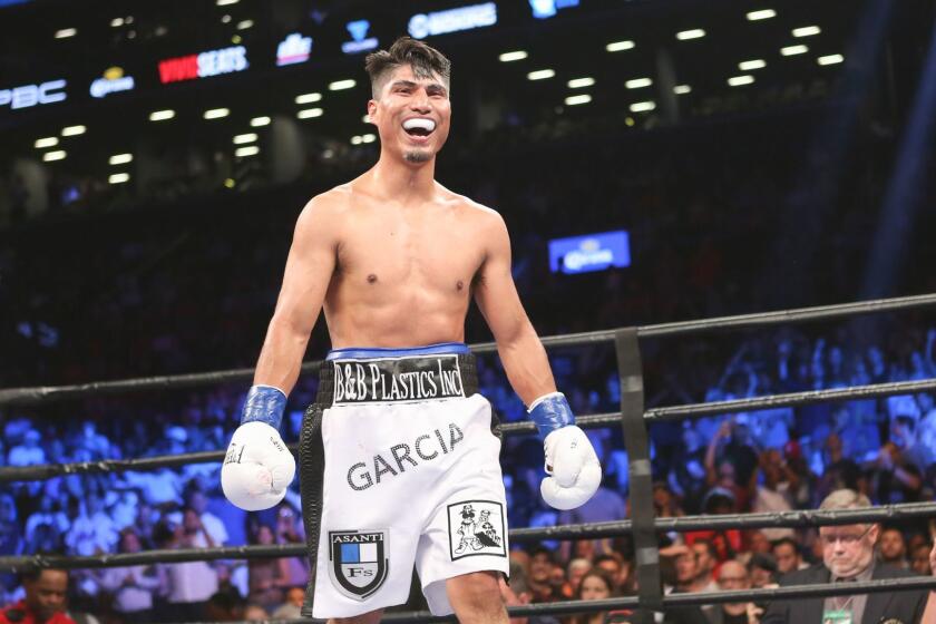 Mikey Garcia reacts after he wins his fight against Elio Rojas at the Barclays Center in the Brooklyn borough of New York on Saturday, July 30, 2016. Mikey Garcia won via knockout. (AP Photo/Steve Luciano)