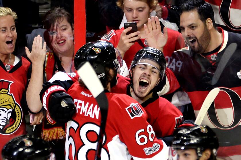 Ottawa Senators center Jean-Gabriel Pageau (44) celebrates his game-winning goal with left wing Mike Hoffman (68) against the New York Rangers during the second overtime of Game 2 of an NHL hockey Stanley Cup second-round playoff series Saturday, April 29, 2017, in Ottawa, Ontario. The Senators won 6-5. (Adrian Wyld/The Canadian Press via AP)
