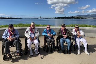 A group of Veterans visit Pearl Harbor in 2019, with founder Donnie Edwards and Amanda Thompson of The Best Defense Foundation.