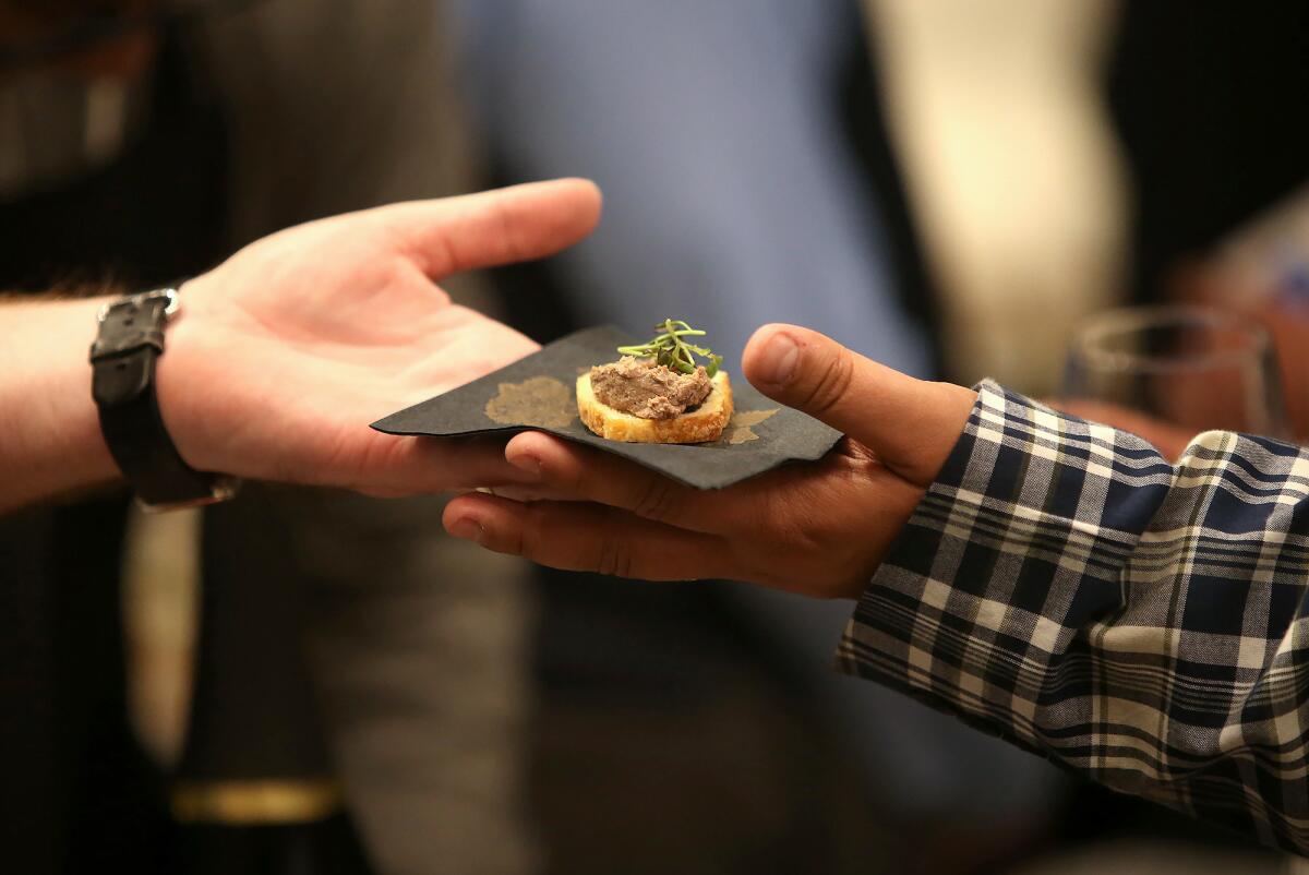 Olea restaurant served bites of duck liver pate at the 2019 Newport Beach Restaurant Week kickoff party. This year's party on Thursday will serve as a prelude to Restaurant Week, which actually runs two weeks, from Monday to Jan. 26.