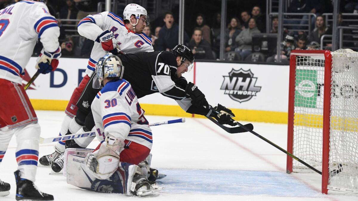 Los Angeles Kings left wing Tanner Pearson (70) scores behind New York Rangers goalie Henrik Lundqvist during the second period.