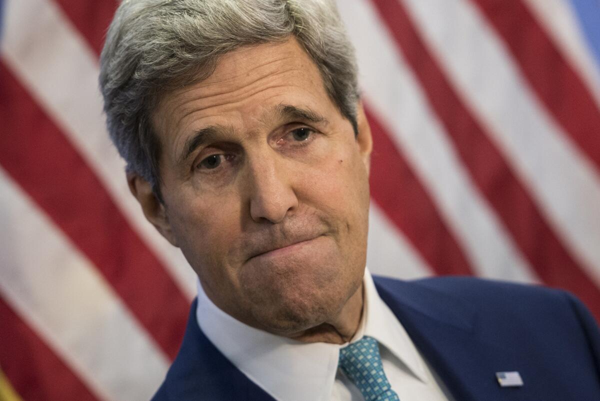 Secretary of State John Kerry discusses Iran during a news conference in Ankara, Turkey.