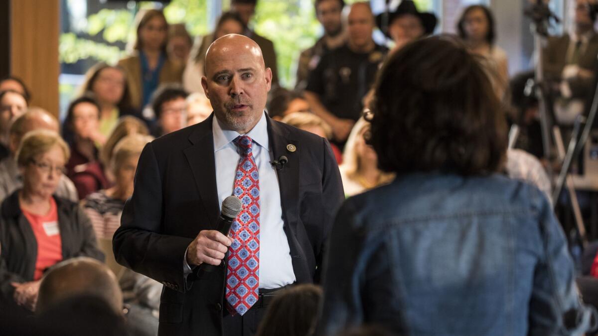 Rep. Tom MacArthur (R-N.J.) speaks to constituents during a town hall meeting in Willingboro, N.J., in May 2017.