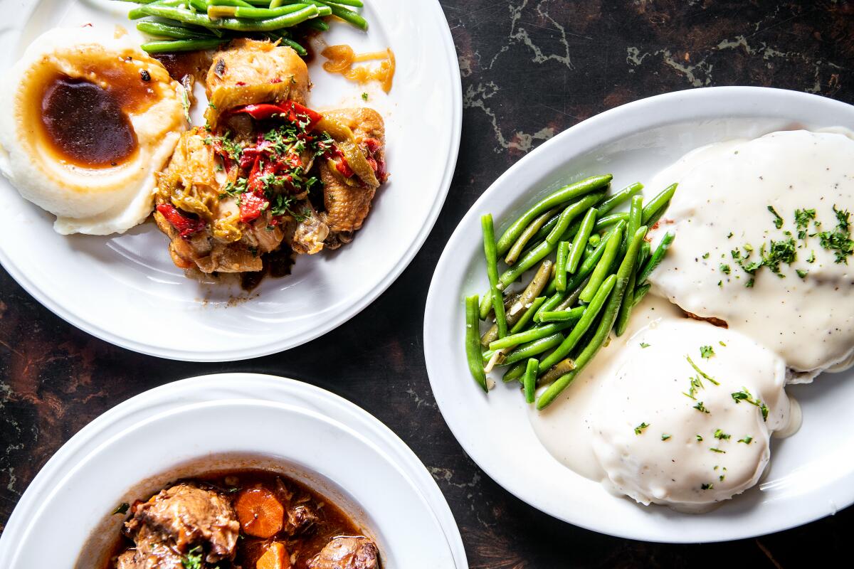 Clockwise from top: Basque chicken, chicken fried steak and oxtail stew from Centro Basco.