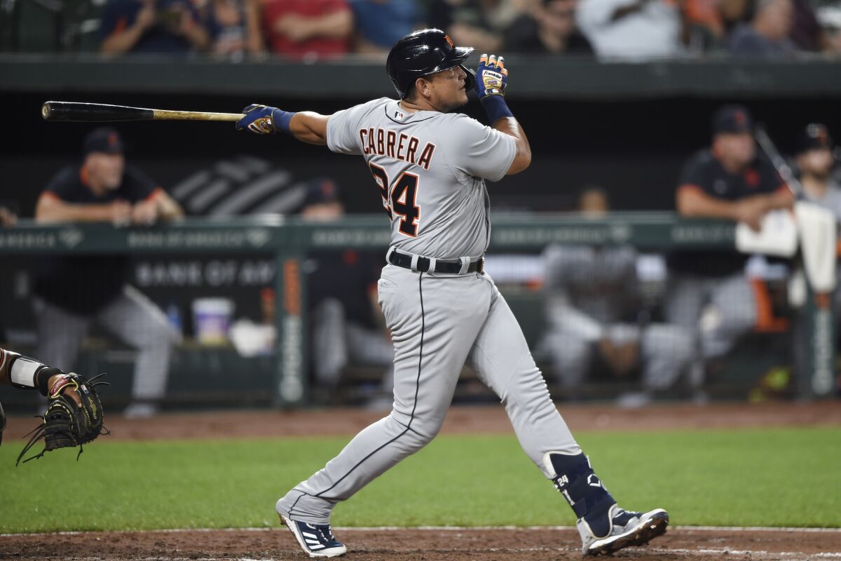 Detroit Tigers' Miguel Cabrera follows through on his 499th career home run, during the fifth inning of the team's baseball game against the Baltimore Orioles, Wednesday, Aug. 11, 2021, in Baltimore.(AP Photo/Gail Burton)