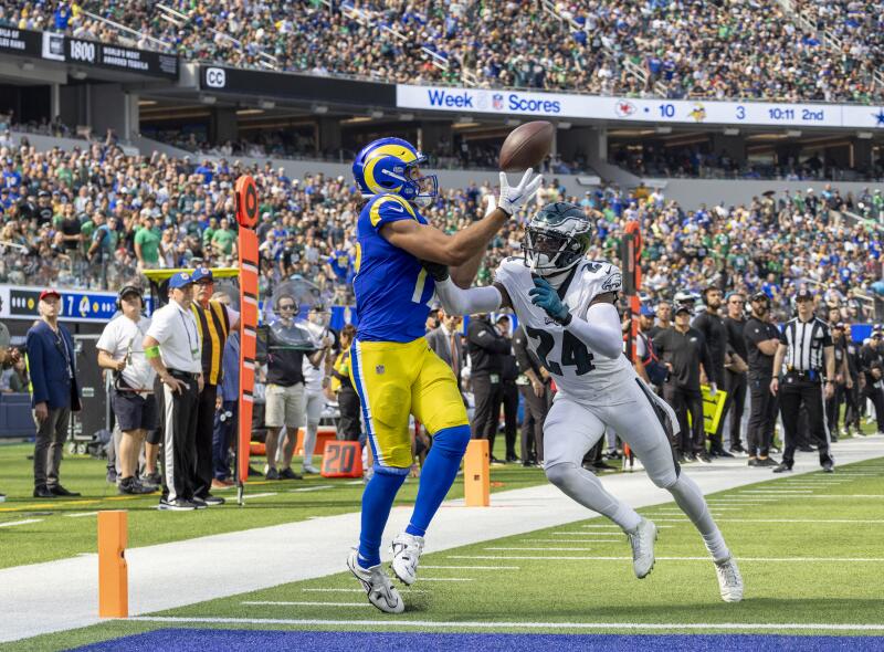 Rams wide receiver Puka Nacua hauls in a second quarter touchdown pass over Eagles cornerback James Bradberry.