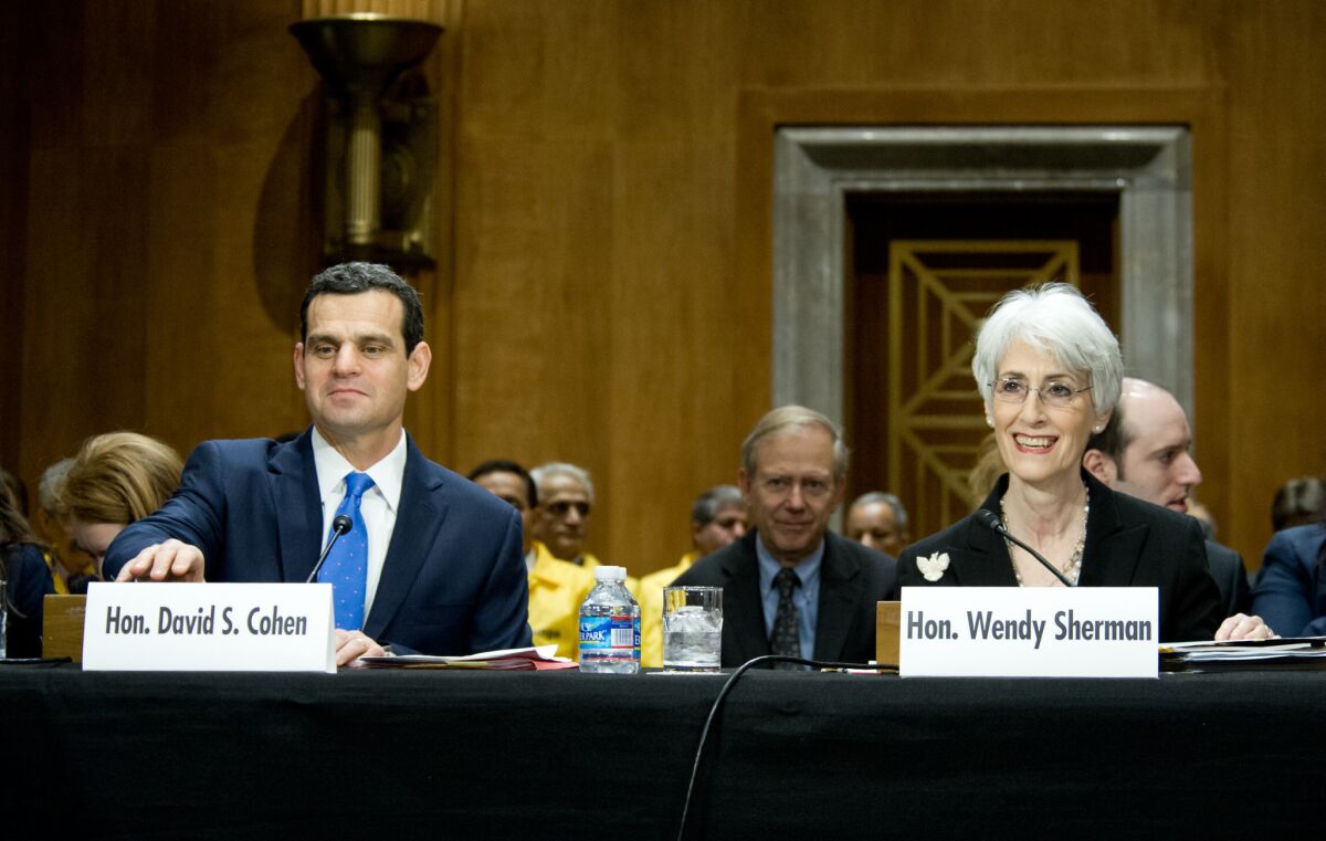 U.S. Undersecretary of State for Political Affairs Wendy Sherman and Treasury Undersecretary for Terrorism and Financing David Cohen testify before the Senate Foreign Relations Committee in Washington.