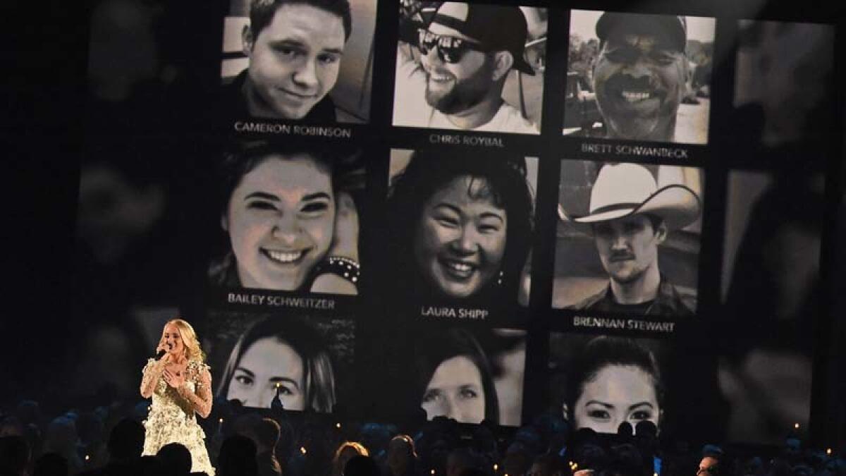 Carrie Underwood sings during the in memoriam segment at the 51st CMA Awards.
