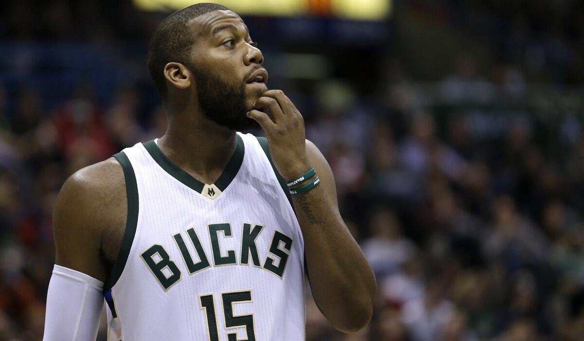 Milwaukee Bucks' Greg Monroe looks during the first half of a game against the Golden State Warriors on Saturday.