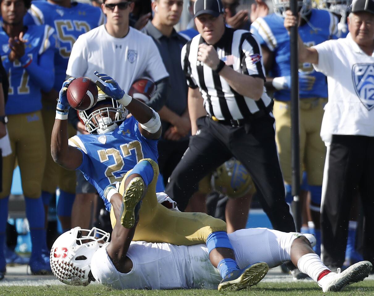 UCLA running back Joshua Kelley makes a catch for a first down against Stanford in the second quarter.