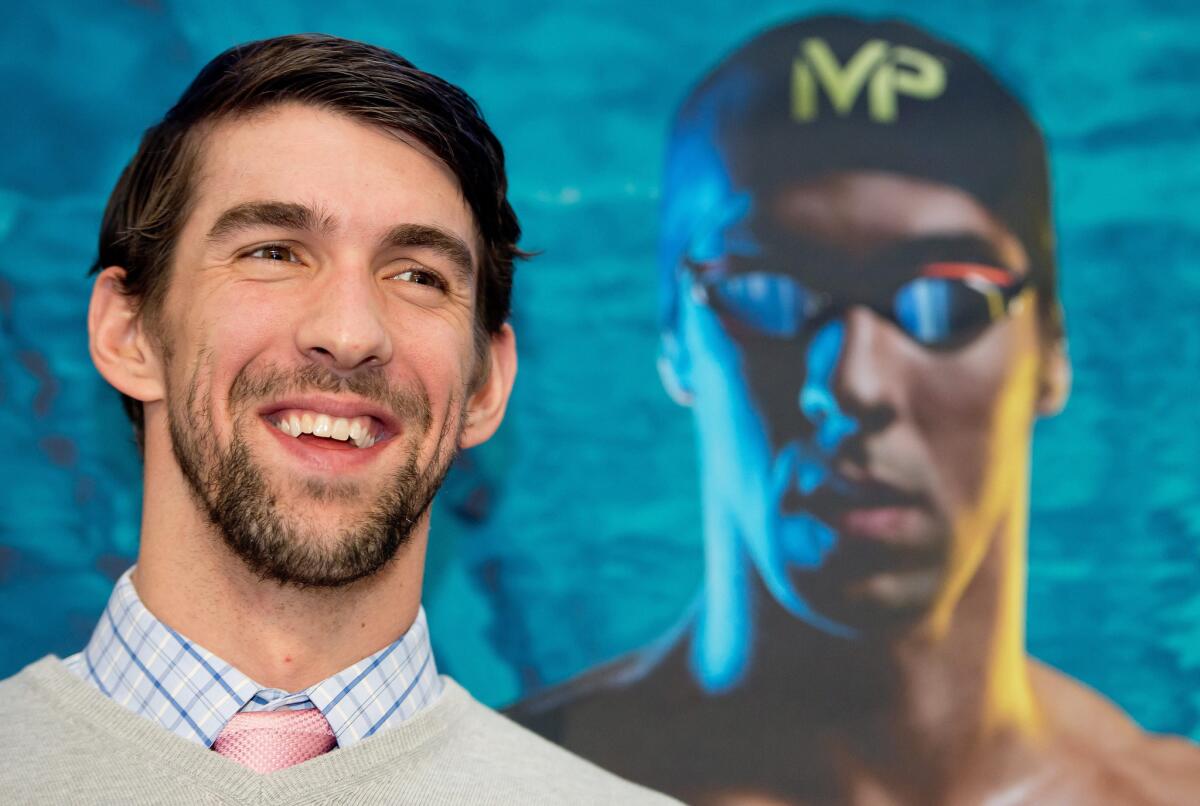 Michael Phelps smiles during a news conference as part of the ISPO sporting equipment trade show in Munich, Germany, on Friday.