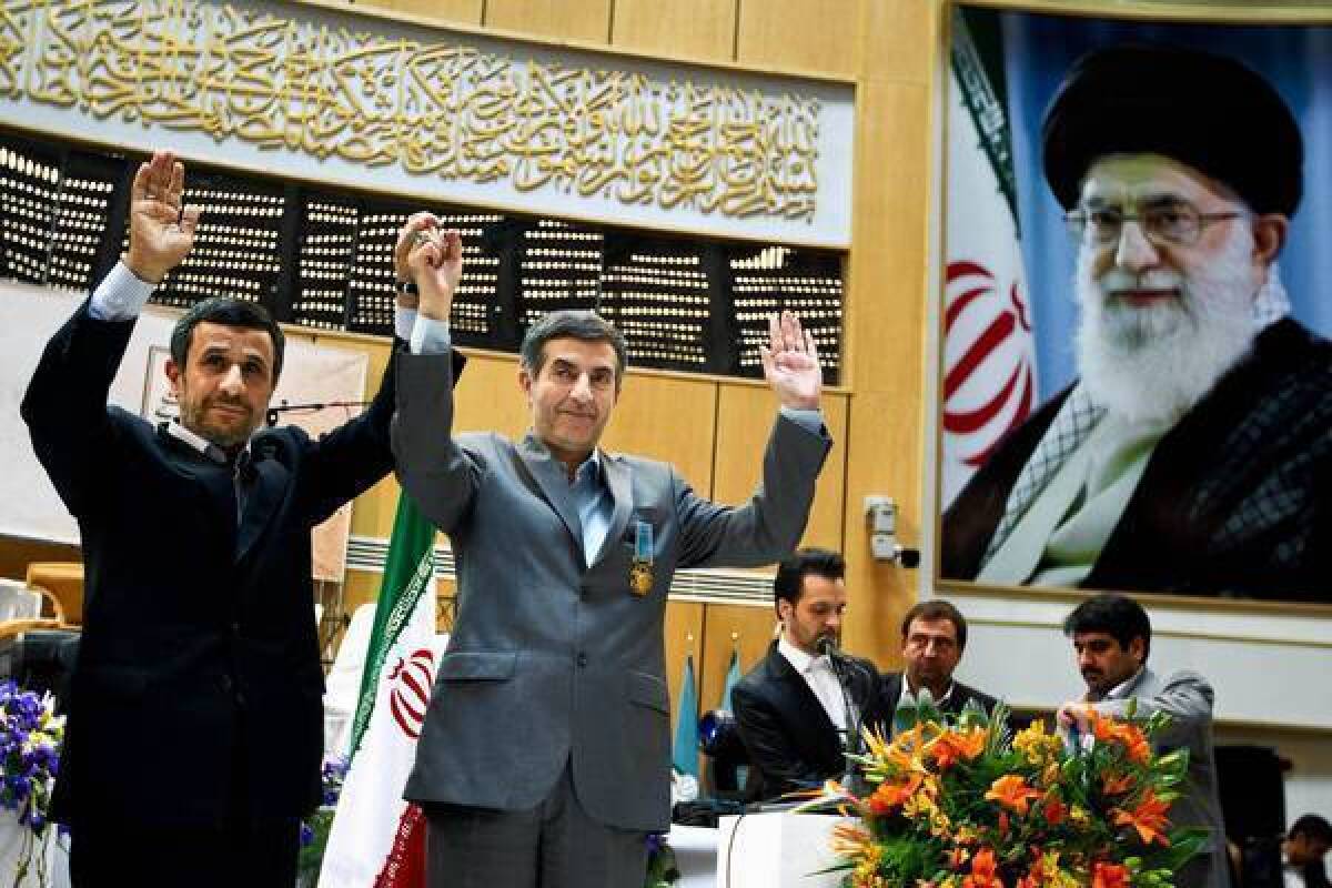Iranian President Mahmoud Ahmadinejad, left, and chief advisor Esfandiar Rahim Mashaei attend a news conference in Tehran last month.