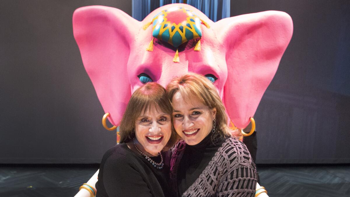 Singer-actress Patti LuPone, left, with soprano Patricia Racette, who plays the ghost of Marie Antionette in the opera "The Ghosts of Versailles," and a pivotal elephant.