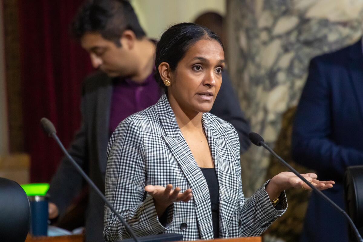 Los Angeles City Councilmember Nithya Raman speaks at the podium.