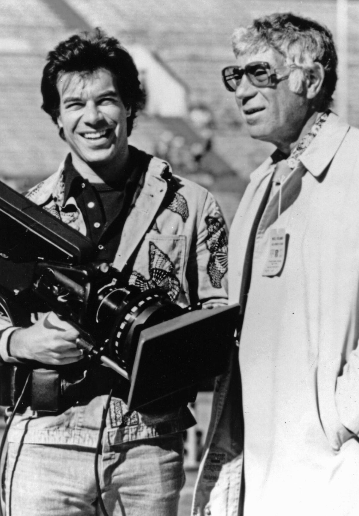 NFL Films founder Ed Sabol, right, and his son, Steve, in an undated photo.