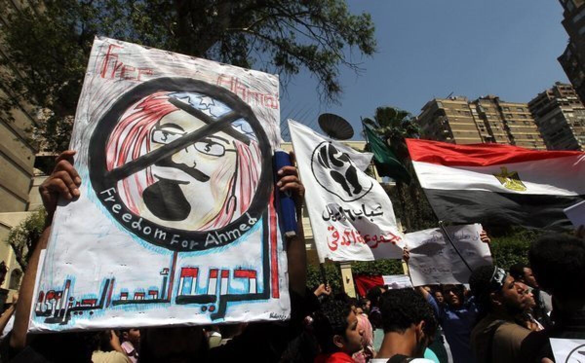 Egyptians protest outside the Saudi embassy in Cairo in April after the arrest in Saudi Arabia of Egyptian activist Ahmed Gizawi on drug charges. A Saudi court on Tuesday sentenced Gizawi to five years in prison and 300 lashes.