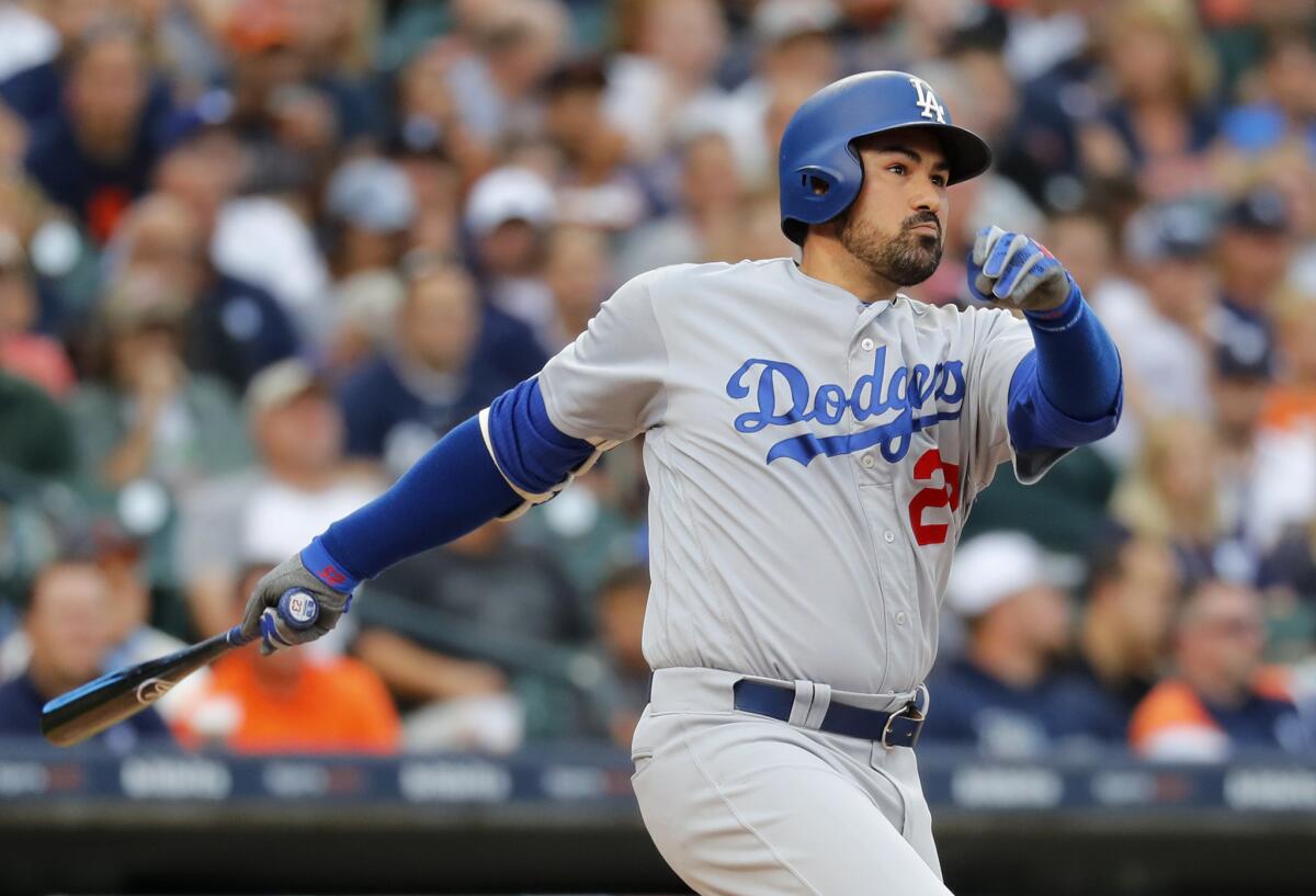 Los Angeles Dodgers' Adrian Gonzalez hits a double against the Detroit Tigers in the second inning of a baseball game in Detroit, Friday, Aug. 18, 2017.