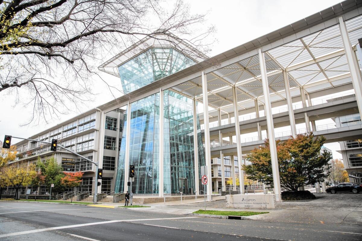 The pension fund has already warned cities that they are in the midst of a six-year span in which pension payments will rise 50%. The new plan will add even more to those costs. Above, CalPERS offices in Sacramento.