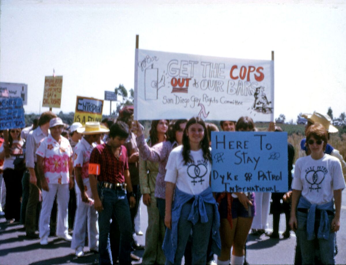 San Diegans protest after a bathroom sting at a Mission Valley department store led to the arrests of several men in 1974.