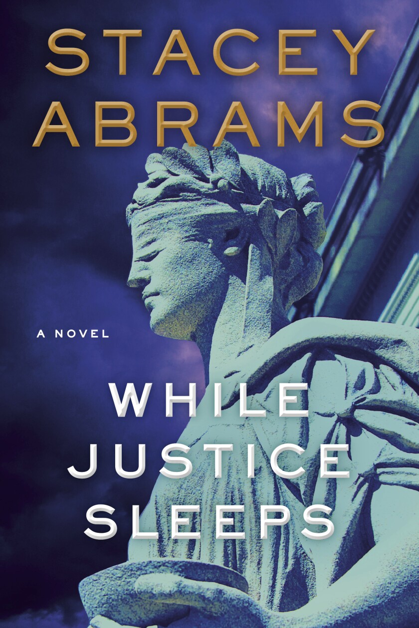 This image released by Doubleday shows "While Justice Sleeps," a novel by Stacey Abrams. (Doubleday via AP)